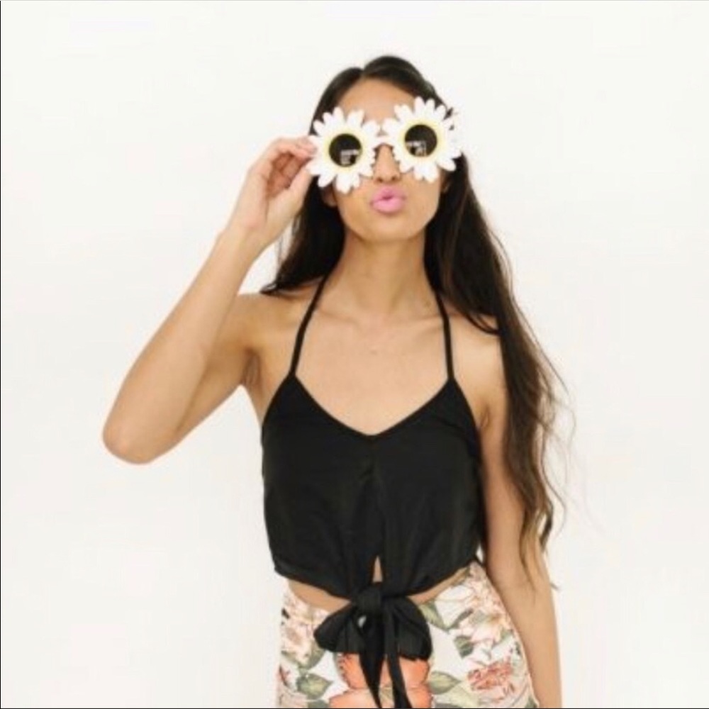 Kortni Jeane tied up top.